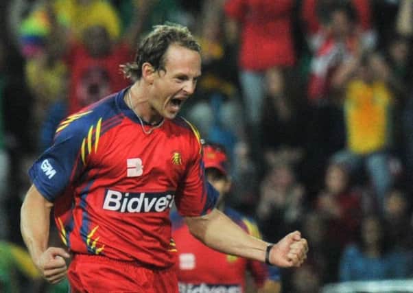 Shane Burger celebrates the dismissal of Sachin Tendulkar during a Champions League Twenty20 match between Mumbai Indians and Lions in September 2010. Picture: Getty Images