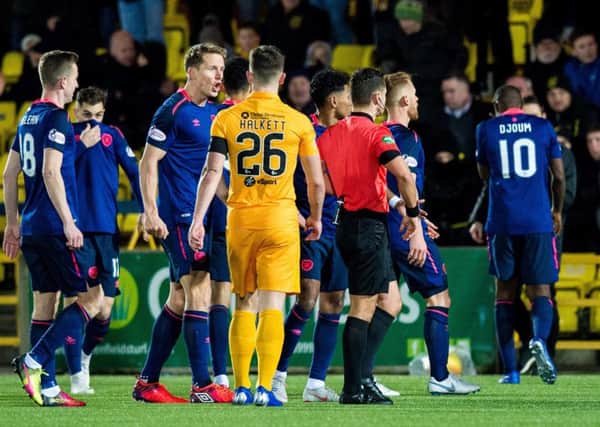 Arnaud Djoum is sent off by Nick Walsh. Picture: SNS/Ross Parker