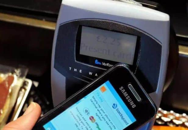 A contactless mobile phone payment