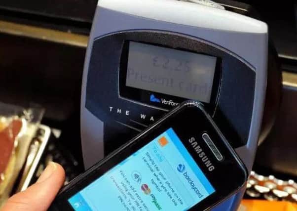 A contactless mobile phone payment