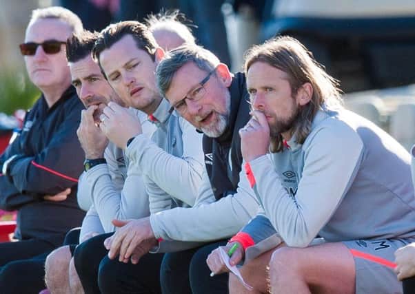 Hearts' management team will hope to guide them past Livingston in the Scottish Cup. Pic: SNS
