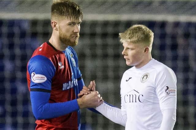 Calum Hall, right, shakes hands with Inverness CTs Shaun Rooney