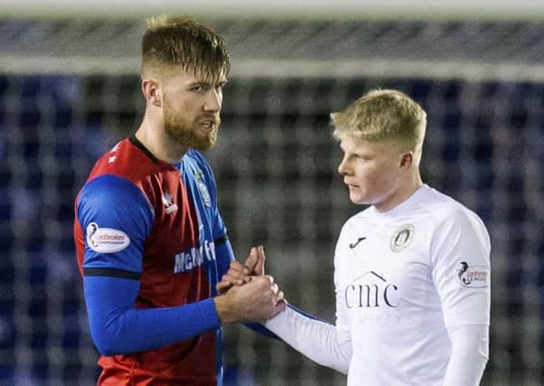 Calum Hall, right, shakes hands with Inverness CTs Shaun Rooney