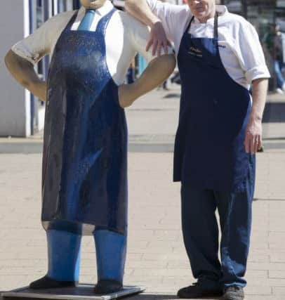 Billy Hoy of Findlay's butchers in portobello with Bob the butcher