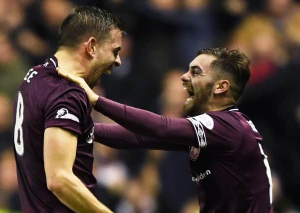 Olly Lee, left, celebrates his derby goal with Ben Garuccio at Easter Road