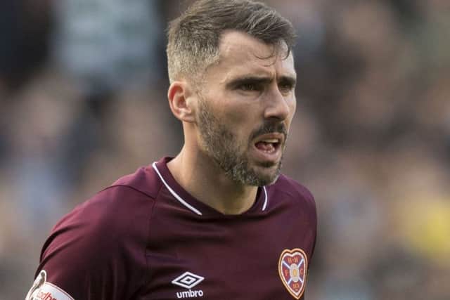 Michael Smith has signed a new deal to remain at Hearts until 2021. Picture: SNS