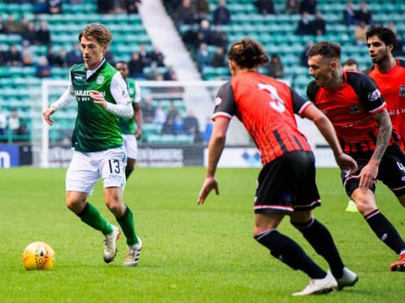 Ryan Gauld shakes off three Elgin City players as he settles back into Scottish football
