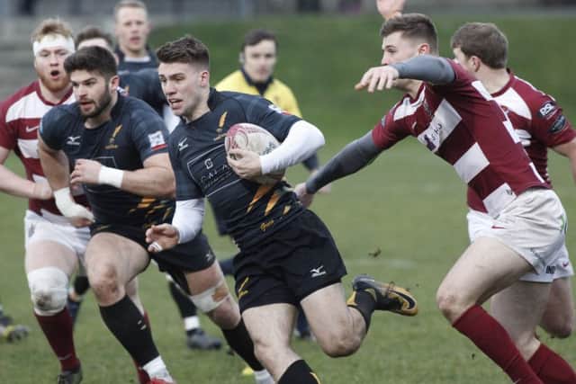 Ben Robbins for Currie, makes a break against Watsonians at Myreside