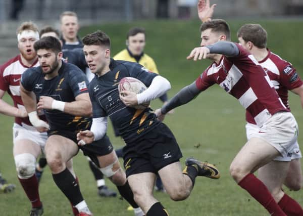 Ben Robbins for Currie, makes a break against Watsonians at Myreside