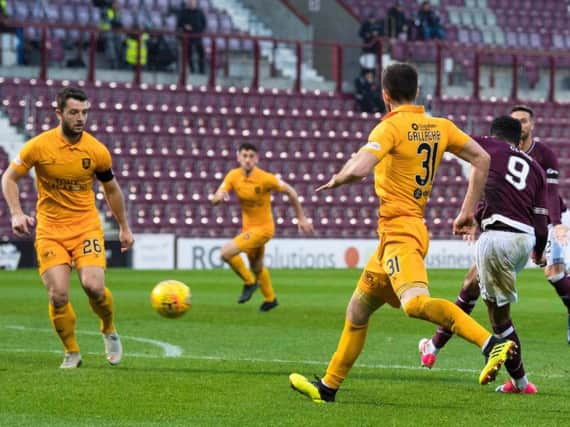 Sean Clare curls home the game's only goal at Tynecastle against Livingston  his first for Hearts. Pic: SNS
