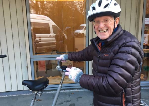 Bryce gets back in the saddle on a VIE Velo tandem bike. Pic: Contributed