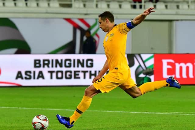 Mark Milligan fires home his penalty