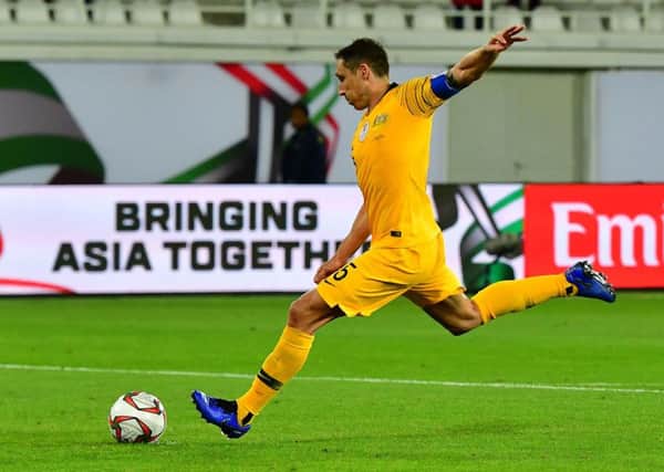 Mark Milligan fires home his penalty