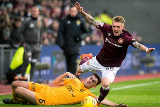 Callumn Morrison takes on Livingstons Shaun Byrne during Hearts 1-0 win in the Scottish Cup. Pic: SNS