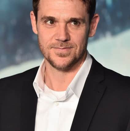 Scottish actor Jamie Sives poses for a photograph on the red carpet. Pic: Ben Stansall/AFP/Getty Images)