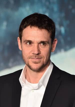 Scottish actor Jamie Sives poses for a photograph on the red carpet. Pic: Ben Stansall/AFP/Getty Images)
