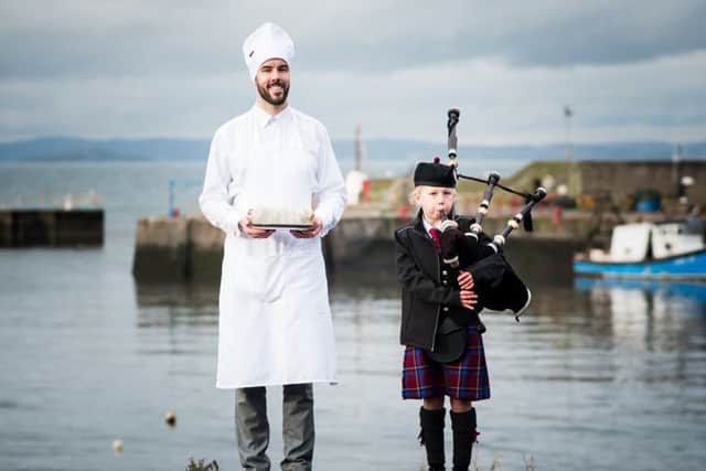 Kirsten with Drum Major Simon Grant. Pic: Fraser Cameron