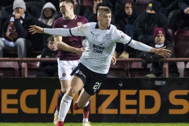 Andy Nelson celebrates his winner for Dundee