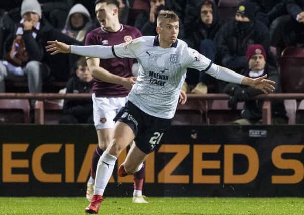 Andy Nelson celebrates his winner for Dundee