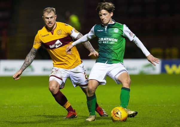 Ryan Gauld, right, competes with Motherwell's Richard Tait