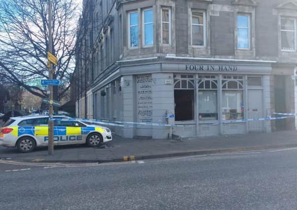 Police cordon off the Four in Hand Bar on Easter Road after a fire. Pic: Contributed.