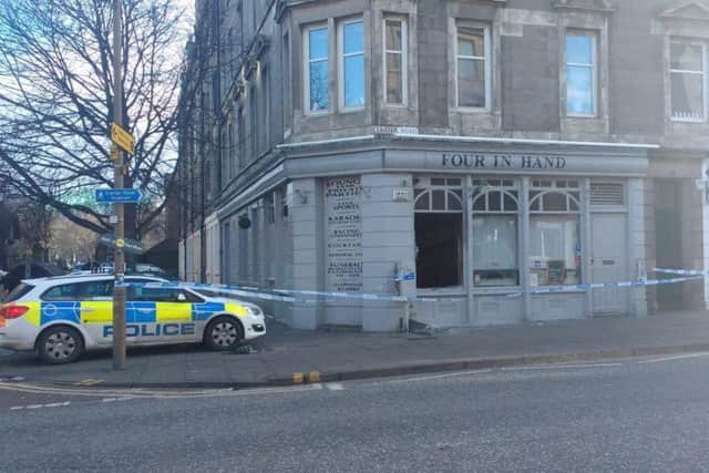 Police cordoned off the Four in Hand Bar on Easter Road after a fire. Pic: Contributed.