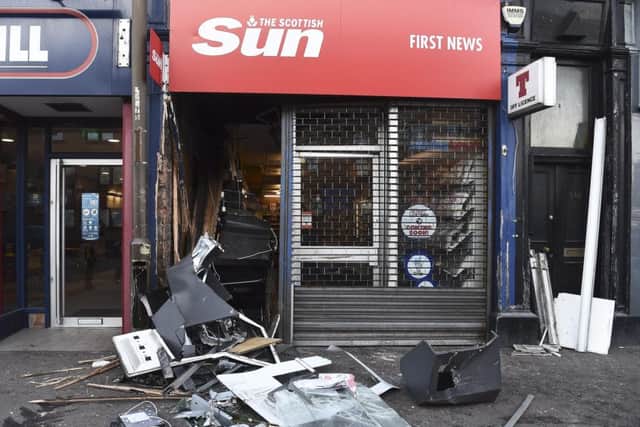 A newsagents on Gorgie Road was ram raided by a digger in the early hoours of the morning.  The thieves had targeted the ATM. Pic: Lisa Ferguson