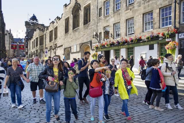 Tourists on the Royal Mile/High Street, Edinburgh during the 2017 Edinburgh International Festival.