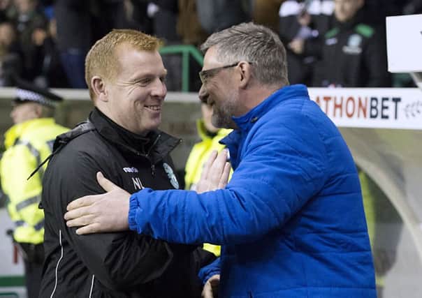 Neil Lennon and Craig Levein exchange greetings before the most recent Edinburgh derby at Easter Road