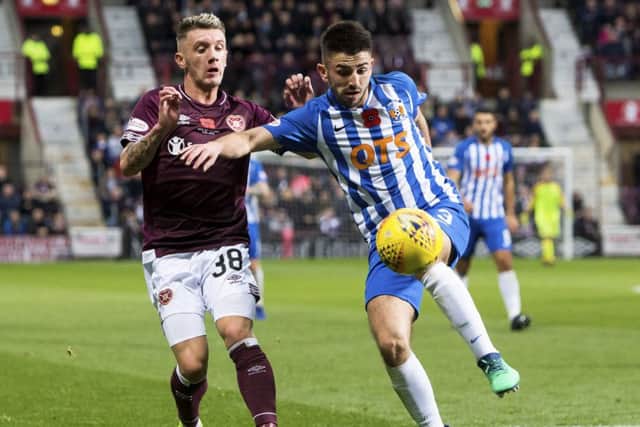 Hearts midfielder Callumn Morrison competes with Killie's Greg Taylor during the visitors' 1-0 win at Tynecastle earlier in the season. Picture: SNS