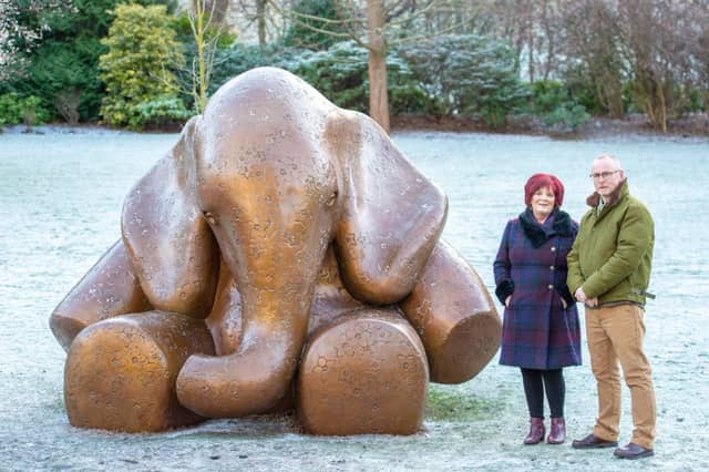 Parent Dorothy Maitland stands with scupltor Andy Scott by the new memorial in Princes Street Gardens.
