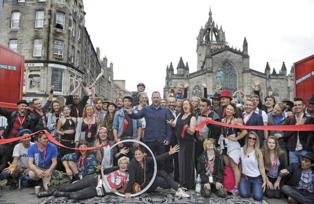Edinburgh Festival Fringe Society's Shona McCarthy unveils the new Virgin Money Street Events on the Royal Mile with Fringe street performers
. Pic: Neil Hanna Photography