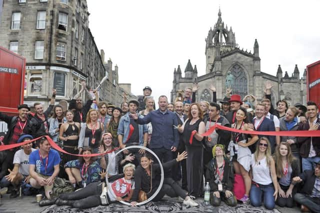 Edinburgh Festival Fringe Society's Shona McCarthy unveils the new Virgin Money Street Events on the Royal Mile with Fringe street performers
. Pic: Neil Hanna Photography