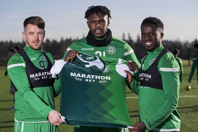 New Hibs recruits Marc McNulty, Darnell Johnson and Gael Bigirimana. Picture: SNS Group