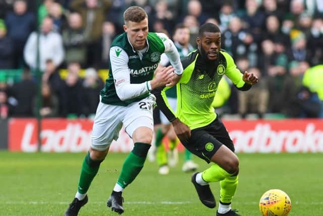Florian Kamberi holds off Olivier Ntcham in the last meeting between Hibs and Celtic. Picture: SNS Group