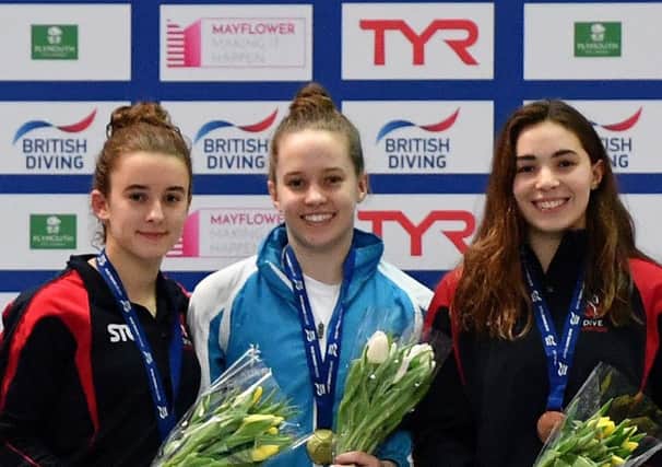 Millie Fowler on the podium after winning the Women's 3m Final. Picture: Harry Trump/Getty Images