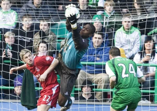 Yves Ma-Kalambay shows his agility to keep Aberdeen out