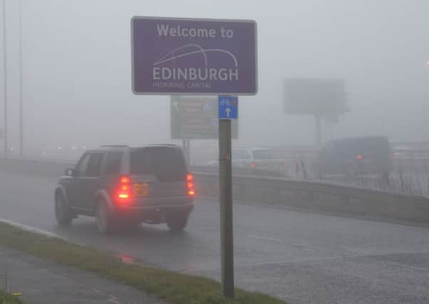 Drivers are being urged to take care in thick fog on the Queensferry Crossing and Forth Road Bridge.