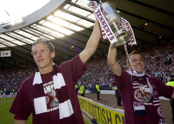 Christophe Berra, right, carries the Scottish Cup in 2006 with Roman Bednar