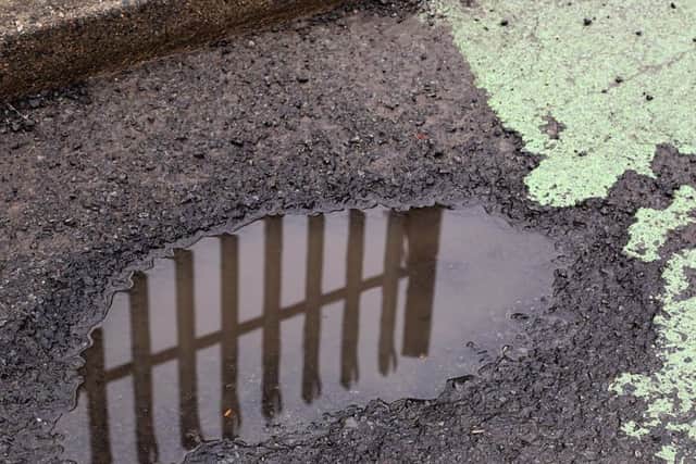 Potholed roads in Midlothian - Eastfield Farm Road, Penicuik.