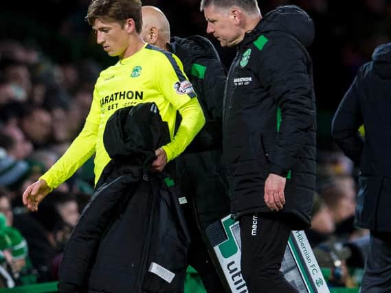 Ryan Gauld had to be substituted after picking up what looked like a hamstring problem. Pic: SNS