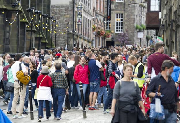 Tourists on the Royal Mile. Picture: Ian Rutherford