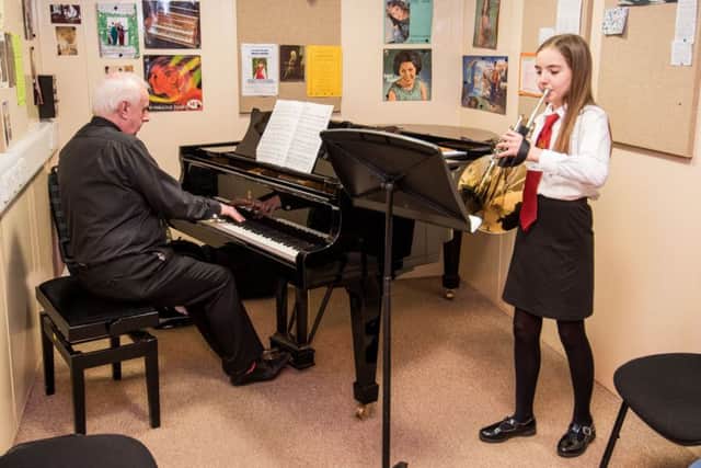 Midlothian Council has put forward plans to axe instrumental music tuition in schools except for pupils in S4 and higher taking SQA music exams. Picture: Ian Georgeson