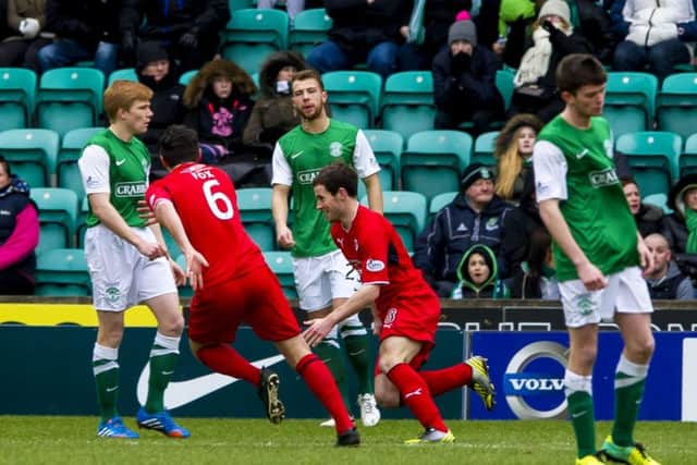 08/02/14 WILLIAM HILL SCOTTISH CUP 5TH RND
HIBERNIAN V RAITH ROVERS (2-3)
EASTER ROAD STADIUM - EDINBURGH
Raith Rovers' Kevin Moon (centre) wheels away to celebrate after scoring an early goal at Easter Road.