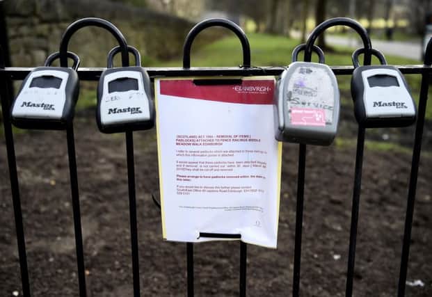 Airbnb locks are now appearing on railings around Edinburgh. Pic: Lisa Ferguson