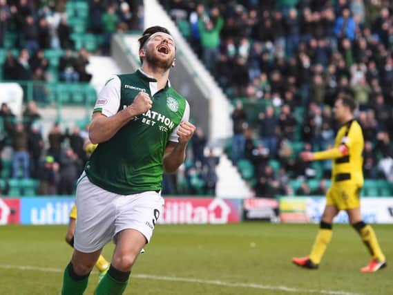 Marc McNulty celebrates his goal for Hibs. Pic: SNS