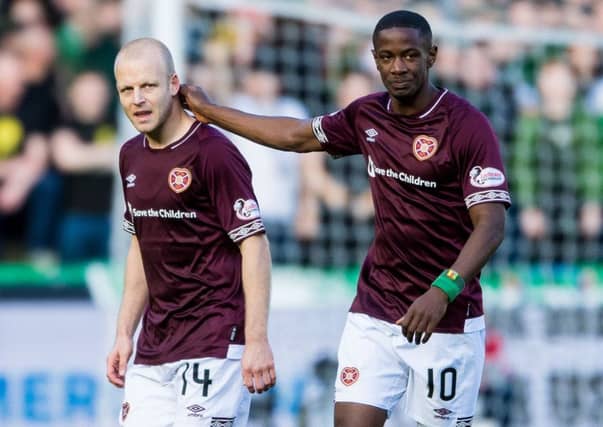 Hearts' Steven Naismith and Arnaud Djoum are wanted by Birmingham City. Picture: SNS/Ross Parker