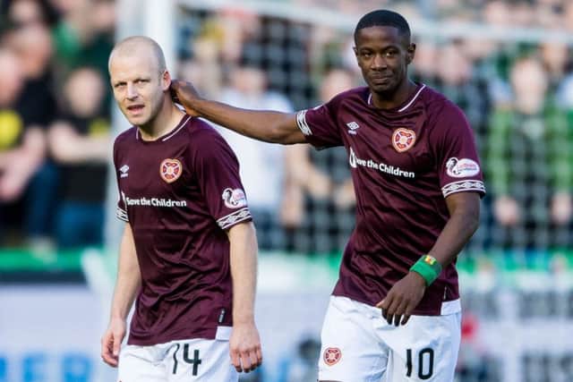 Hearts' Steven Naismith and Arnaud Djoum are wanted by Birmingham City. Picture: SNS/Ross Parker