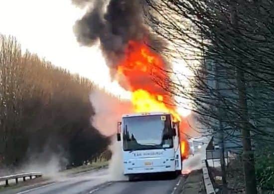 E&M Horsburgh coach catches fire.  Horsburgh are a bus hire company that have the contracts for several schols in the Lothians Picture sent in by passenger on A71 by bells Quarry