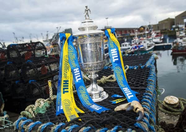Hearts and Hibs are hoping to get their hands on the William Hill Scottish Cup. Pic: SNS